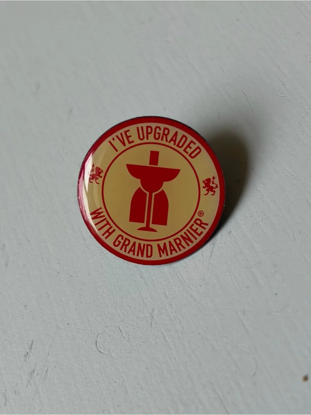 Vintage “I’ve Upgraded with Grand Marnier” Enamel Pinback Tac Hat Lapel Pin